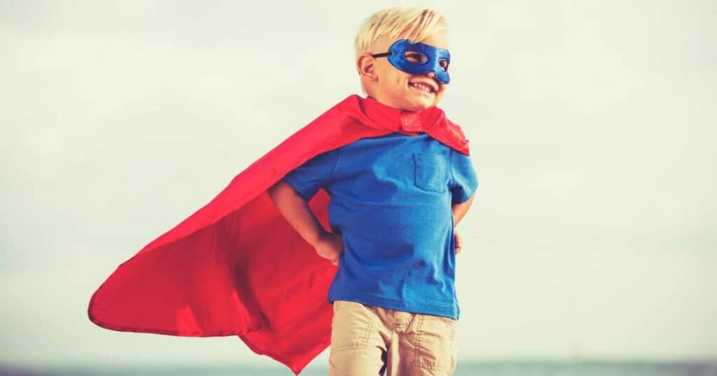 kid in superhero costume